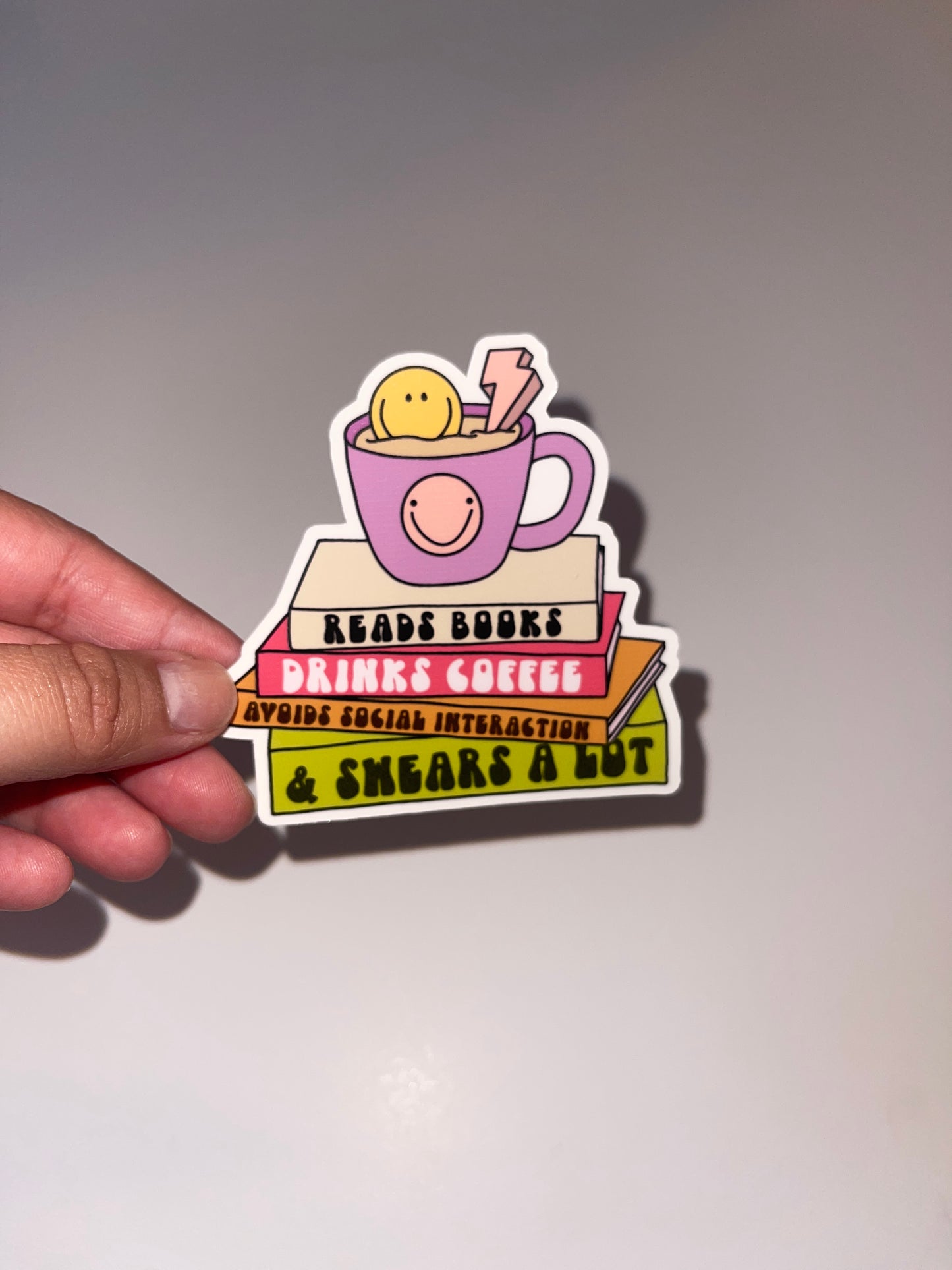 Reads Book, Drinks Coffee Sticker