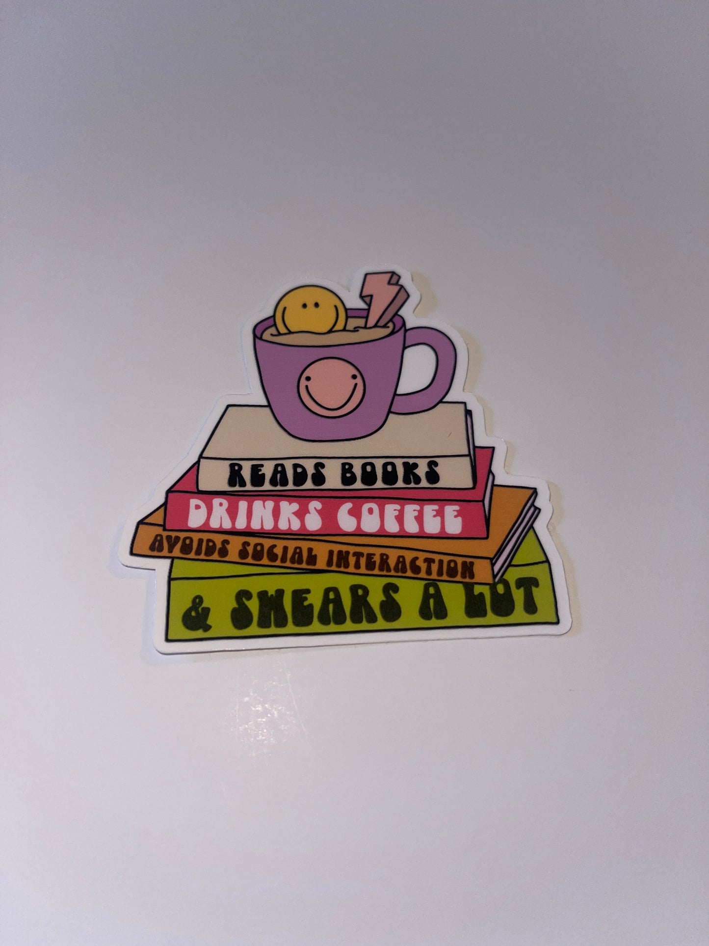 Reads Book, Drinks Coffee Sticker